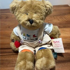 Rufus the Bear w/ Diabetes by Russ Berrie and company has clothing and bracelet